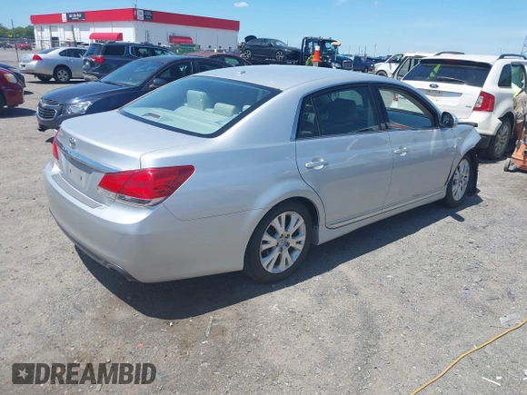 2011 Toyota Avalon with VIN 4T1BK3DBXBU411770, listed as a IAAI auction lot 42060147 with 128,360 mi miles and . Bid and sale history available at carsss.com. Image 4.