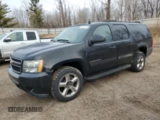2011 Chevrolet Suburban LT with VIN 1GNSKJE33BR389346, listed as a Copart auction lot 48250195 with 217,815 mi miles and Salvage Title. Bid and sale history available at carsss.com. Image 1.