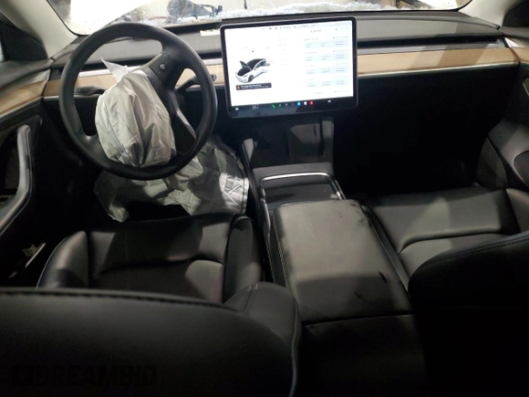 2021 Tesla Model 3 Standard Range Plus z VIN 5YJ3E1EA4MF988784, wystawiony jako Copart lot #88138765 z przebiegiem 62 438 mil mil oraz Szkody całkowita. Historia ofert i sprzedaży dostępna na DreamBid. Obrazek 8.