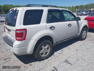 2010 Ford Escape XLT with VIN 1FMCU0D74AKC67975, listed as a IAAI auction lot 41996023 with 199,626 mi miles. Bid and sale history available at carsss.com. Image 4.