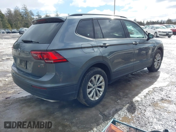 2018 Volkswagen Tiguan S with VIN 3VV0B7AX2JM011628, listed as a IAAI auction lot 41685841 with 129,484 mi miles and . Bid and sale history available at DreamBid. Image 4.