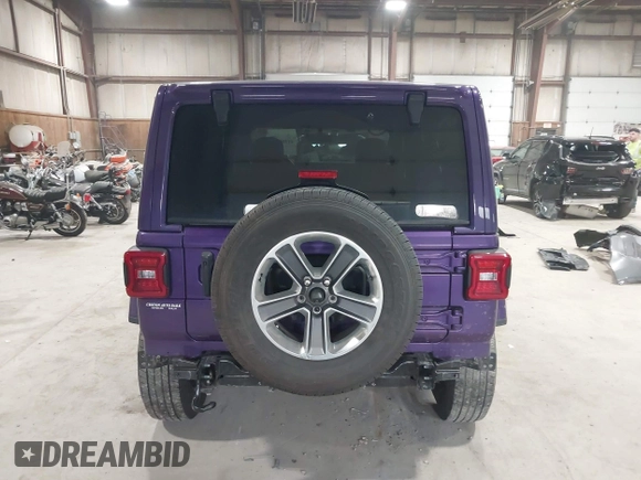 2023 Jeep Wrangler Sahara with VIN 1C4HJXEN9PW560958, listed as a IAAI auction lot 41980179 with 35,975 mi miles and . Bid and sale history available at DreamBid. Image 17.