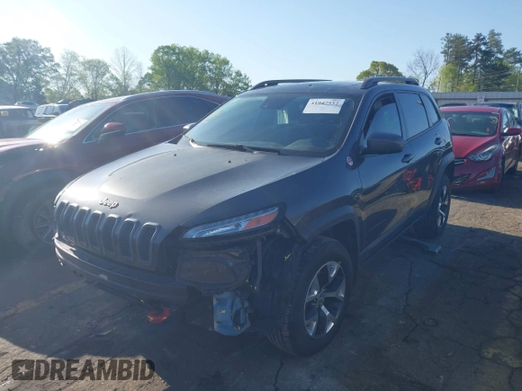 2014 Jeep Cherokee Trailhawk with VIN 1C4PJMBS6EW167517, listed as a IAAI auction lot 41947552 with 233,572 mi miles. Bid and sale history available at carsss.com. Image 18.