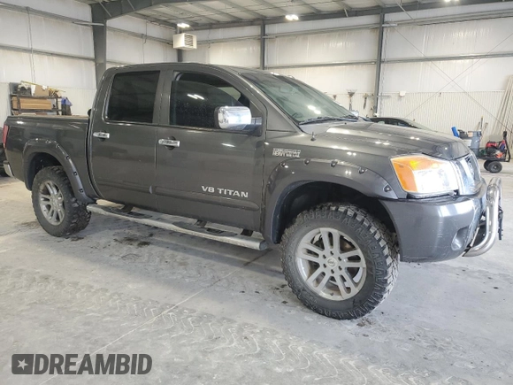 2012 Nissan Titan SL with VIN 1N6BA0ECXCN300562, listed as a Copart auction lot 58244125 with 131,595 mi miles and Salvage title. Bid and sale history available at DreamBid. Image 4.