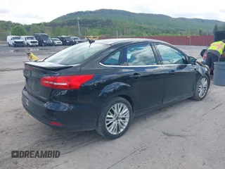 2015 Ford Focus Titanium с VIN 1FADP3J28FL213712, выставлен на аукционе IAAI как лот 42158433 с пробегом 173 696 миль миль и . История ставок и продаж доступна на DreamBid. Изображение 4.