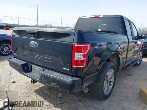 2018 Ford F-150 XL with VIN 1FTEX1EP8JFE62690, listed as a IAAI auction lot 41936883 with 162,174 mi miles. Bid and sale history available at carsss.com. Image 4.