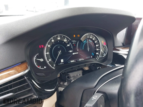 2019 BMW 5 Series 530e with VIN WBAJA9C56KB388241, listed as a IAAI auction lot 42181217 with 69,805 mi miles and . Bid and sale history available at carsss.com. Image 7.