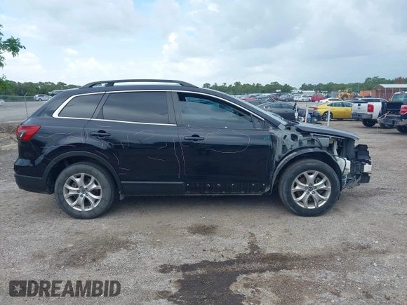 2015 Mazda CX-9 Touring with VIN JM3TB2CA4F0465730, listed as a IAAI auction lot 42512203 with 179,805 mi miles and . Bid and sale history available at DreamBid. Image 14.