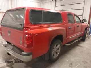 2008 Dodge Dakota Laramie z VIN 1D7HW58N58S534499, wystawiony jako IAAI lot #41528141 z przebiegiem 127 340 mil mil oraz . Historia ofert i sprzedaży dostępna na DreamBid. Obrazek 4.