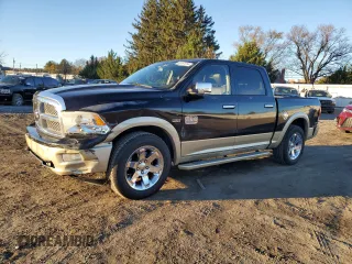 2012 Ram 1500 Laramie Longhorn with VIN 1C6RD6PT8CS216595, listed as a Copart auction lot 80157514 with 126,752 mi miles and Salvage title. Bid and sale history available at DreamBid. Image 1.
