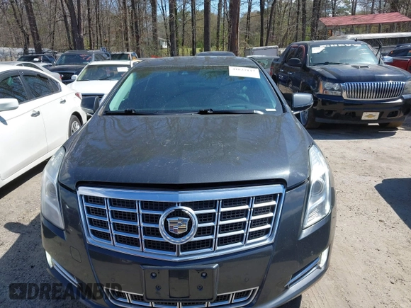 2013 Cadillac XTS Premium with VIN 2G61S5S33D9113653, listed as a IAAI auction lot 41837117 with 101,049 mi miles and . Bid and sale history available at DreamBid. Image 11.
