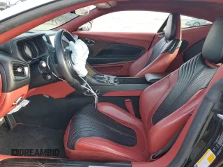 2018 Aston Martin DB11 z VIN SCFRMFAV8JGL03322, wystawiony jako Copart lot #86810004 z przebiegiem Nie podano mil oraz Szkody całkowita. Historia ofert i sprzedaży dostępna na DreamBid. Obrazek 7.