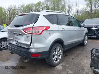 2015 Ford Escape Titanium with VIN 1FMCU9JX2FUA24279, listed as a IAAI auction lot 41930868 with 254,997 mi miles. Bid and sale history available at carsss.com. Image 4.