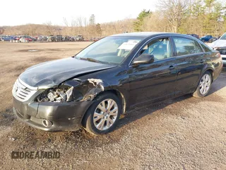 2010 Toyota Avalon XL with VIN 4T1BK3DB0AU355952, listed as a IAAI auction lot 41834083 with 177,098 mi miles and . Bid and sale history available at DreamBid. Image 2.