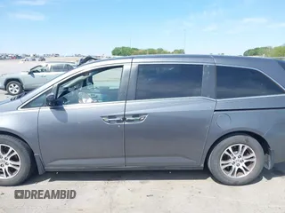 2011 Honda Odyssey EX-L with VIN 5FNRL5H69BB092752, listed as a IAAI auction lot 42245534 with 142,718 mi miles and . Bid and sale history available at DreamBid. Image 14.