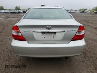 2004 Toyota Camry LE with VIN 4T1BE30K64U323377, listed as a Copart auction lot 58249465 with 274,902 mi miles and Salvage title. Bid and sale history available at DreamBid. Image 6.