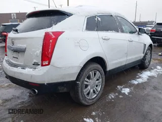 2016 Cadillac SRX Luxury Collection with VIN 3GYFNBE38GS532443, listed as a IAAI auction lot 41151179 with 74,499 mi miles. Bid and sale history available at carsss.com. Image 4.
