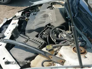 2013 Chevrolet Impala LS with VIN 2G1WA5E31D1108640, listed as a IAAI auction lot 42470354 with 121,987 mi miles and . Bid and sale history available at DreamBid. Image 20.