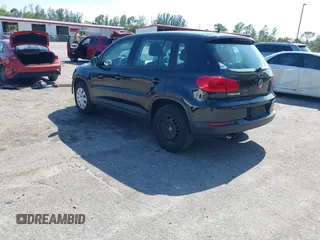 2017 Volkswagen Tiguan S with VIN WVGAV7AX5HK048843, listed as a IAAI auction lot 42029583 with 73,892 mi miles and . Bid and sale history available at DreamBid. Image 3.