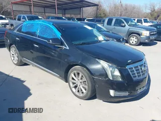 2013 Cadillac XTS Luxury with VIN 2G61P5S31D9116567, listed as a IAAI auction lot 41668056 with 196,744 mi miles. Bid and sale history available at carsss.com. Image 1.