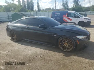 2015 BMW M4 with VIN WBS3R9C57FK332862, listed as a Copart auction lot 59395104 with 63,112 mi miles and Salvage Title. Bid and sale history available at carsss.com. Image 4.