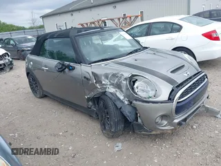 2017 MINI Convertible Cooper S with VIN WMWWG9C34H3C81035, listed as a IAAI auction lot 42216900 with 61,996 mi miles and . Bid and sale history available at DreamBid. Image 1.