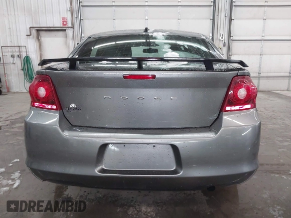 2013 Dodge Avenger SE with VIN 1C3CDZAB1DN581303, listed as a IAAI auction lot 41942469 with 123,330 mi miles. Bid and sale history available at carsss.com. Image 17.