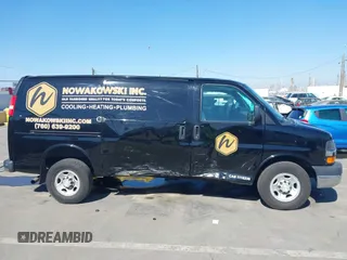 2016 Chevrolet Express Cargo Van with VIN 1GCWGAFF0G1154459, listed as a IAAI auction lot 41647930 with 100,142 mi miles. Bid and sale history available at carsss.com. Image 13.