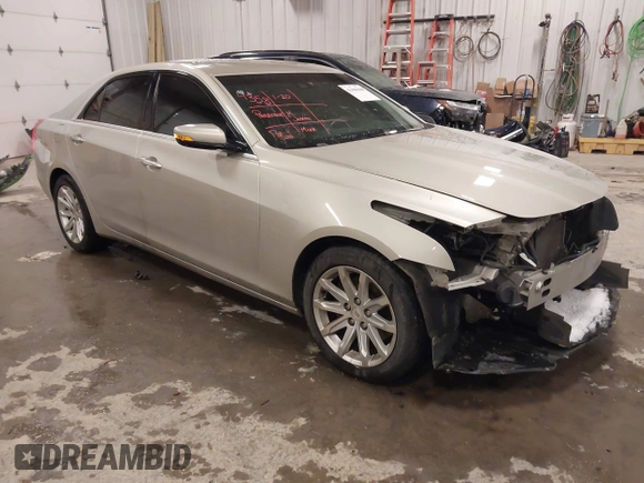 2014 Cadillac CTS Luxury AWD with VIN 1G6AX5S3XE0197628, listed as a IAAI auction lot 41400988 with 144,026 mi miles and . Bid and sale history available at DreamBid. Image 1.