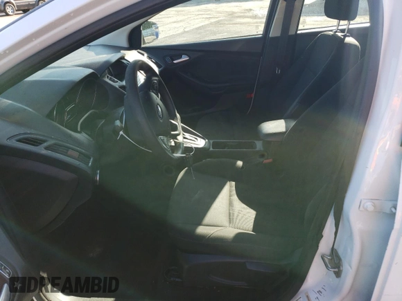 2017 Ford Focus SE with VIN 1FADP3F28HL309268, listed as a Copart auction lot 57995985 with 99,277 mi miles and Salvage title. Bid and sale history available at DreamBid. Image 7.