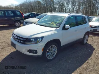 2012 Volkswagen Tiguan S with VIN WVGBV7AX0CW582922, listed as a IAAI auction lot 41906974 with 150,681 mi miles and . Bid and sale history available at DreamBid. Image 2.