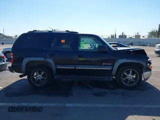 2002 Chevrolet Tahoe Z71 with VIN 1GNEK13TX2R324834, listed as a IAAI auction lot 41298063 with 1 mi miles. Bid and sale history available at carsss.com. Image 12.