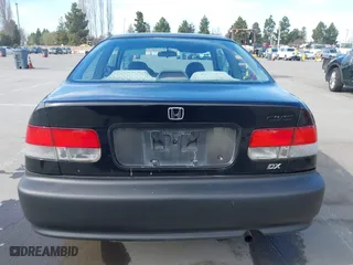 1999 Honda Civic DX with VIN 1HGEJ6223XL034321, listed as a IAAI auction lot 41647713 with 271,526 mi miles. Bid and sale history available at carsss.com. Image 16.