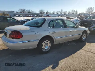 2002 Lincoln Continental with VIN 1LNHM97V92Y693261, listed as a Copart auction lot 88350795 with 100,809 mi miles and Clean Title. Bid and sale history available at carsss.com. Image 3.