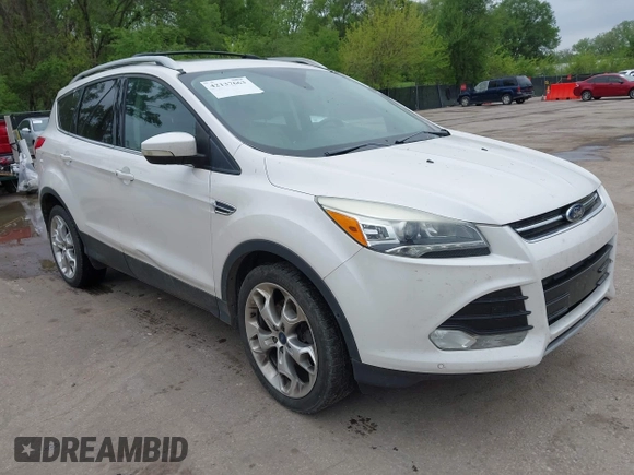 2016 Ford Escape Titanium with VIN 1FMCU9J96GUB97564, listed as a IAAI auction lot 42137663 with 269,009 mi miles. Bid and sale history available at carsss.com. Image 1.