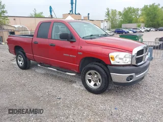 2007 Dodge 1500 SLT with VIN 1D7HU18297J609097, listed as a IAAI auction lot 42059868 with 34,884 mi miles. Bid and sale history available at carsss.com. Image 1.