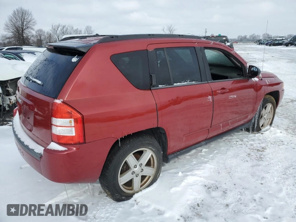 2010 Jeep Compass Sport with VIN 1J4NF4FB2AD525117, listed as a Copart auction lot 79426624 with 149,152 mi miles and Salvage Title. Bid and sale history available at carsss.com. Image 3.