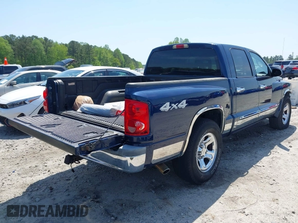 2005 Dodge Dakota SLT with VIN 1D7HW48N05S113487, listed as a IAAI auction lot 42029813 with 229,025 mi miles. Bid and sale history available at carsss.com. Image 4.