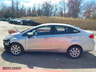 2013 Ford Fiesta SE with VIN 3FADP4BJ2DM173456, listed as a IAAI auction lot 41785902 with 87,004 mi miles. Bid and sale history available at carsss.com. Image 15.