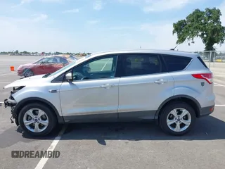 2015 Ford Escape SE with VIN 1FMCU9G93FUA26339, listed as a IAAI auction lot 42039281 with 185,729 mi miles and . Bid and sale history available at DreamBid. Image 15.