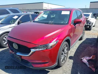2018 Mazda CX-5 Grand Touring with VIN JM3KFBDM2J0333017, listed as a IAAI auction lot 41850431 with 85,000 mi miles. Bid and sale history available at carsss.com. Image 20.