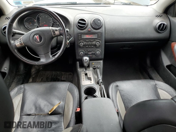 2009 Pontiac G6 GXP 1SA with VIN 1G2ZM577294217264, listed as a Copart auction lot 63824735 with 165,948 mi miles and Salvage title. Bid and sale history available at DreamBid. Image 8.