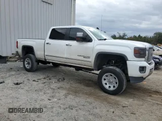2016 GMC Sierra 3500HD Denali z VIN 1GT42YE84GF148264, wystawiony jako Copart lot #79954814 z przebiegiem 182 548 mil mil oraz Szkoda całkowita • Salvage title. Historia ofert i sprzedaży dostępna na DreamBid. Obrazek 4.