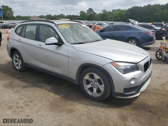 2015 BMW X1 sDrive28i with VIN WBAVM1C57FV314390, listed as a Copart auction lot 53706045 with 137,138 mi miles and Clean Title. Bid and sale history available at carsss.com. Image 4.