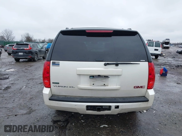 2012 GMC Yukon XL SLT with VIN 1GKS2KE77CR205341, listed as a IAAI auction lot 41565367 with 165,500 mi miles. Bid and sale history available at carsss.com. Image 16.