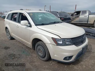 2015 Dodge Journey Crossroad with VIN 3C4PDDGG6FT601017, listed as a Copart auction lot 55485625 with 102,698 mi miles and Salvage title. Bid and sale history available at DreamBid. Image 4.