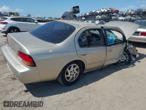 1999 Nissan Maxima GXE z VIN JN1CA21A8XT109136, wystawiony jako IAAI lot #42180758 z przebiegiem 136 876 mil mil oraz . Historia ofert i sprzedaży dostępna na DreamBid. Obrazek 4.