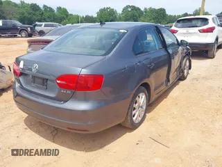 2011 Volkswagen Jetta SE with VIN 3VWDX7AJ4BM330203, listed as a IAAI auction lot 42256889 with 209,557 mi miles and . Bid and sale history available at DreamBid. Image 4.