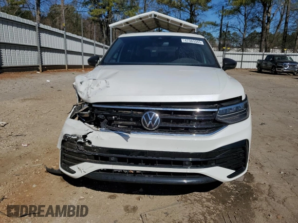 2023 Volkswagen Tiguan SE R-Line Black with VIN 3VVCB7AX6PM001044, listed as a Copart auction lot 47365565 with 20,059 mi miles and Salvage title. Bid and sale history available at DreamBid. Image 5.