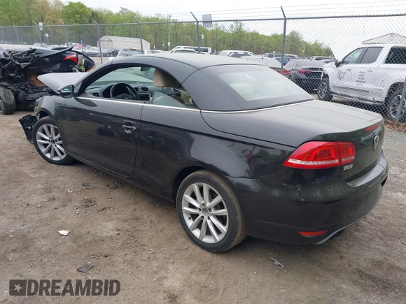2014 Volkswagen Eos Komfort with VIN WVWBW8AH2EV001719, listed as a IAAI auction lot 42080290 with 105,661 mi miles and . Bid and sale history available at DreamBid. Image 3.